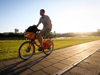 On the Orange Bike in Vilnius on a summer evening