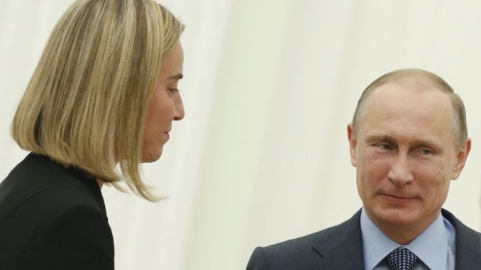 Federica Mogherini and Vladimir Putin