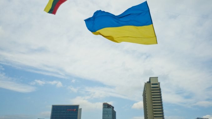Ukrainian and Lithuanian flag in the Vilnius' sky
