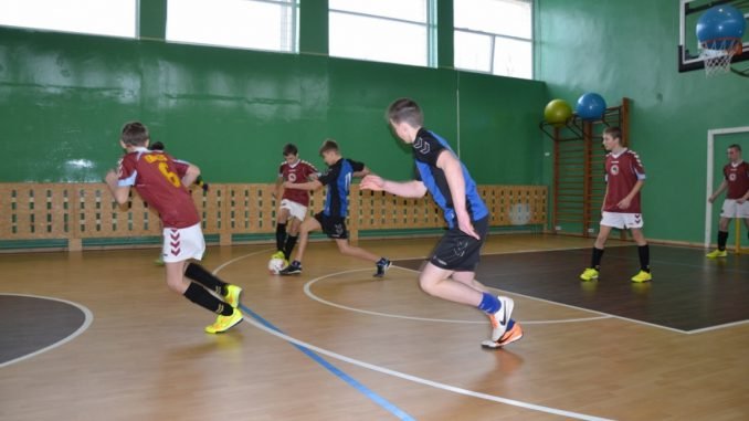 Kids playing football