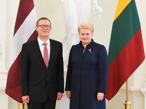 Latvian Ambassador Einars Semanis and President Dalia Grybauskaitė