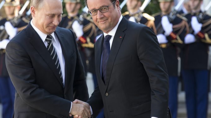 Vladimir Putin and François Hollande 