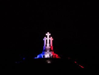 Three crosses coloured in the French flag colours