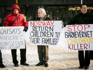 Protesters in front of the Norwegian embassy in Vilnius