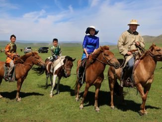 Sanjsuren Boldbaatar horseback riding with his family