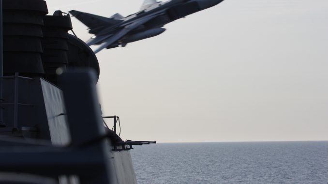 A Russian SU-24 buzzes the USS Donald Cook in the Baltic Sea.