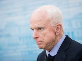 remove Re-Crop Republican Senator John McCain of the US at the Presidential palace in Vilnius
