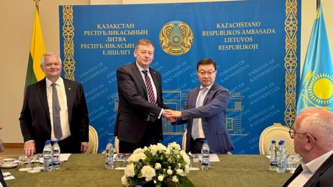 Ambassador of Kazakhstan Timur Urazayev greating Vidmantas Janulevičius and Romas Austinskas